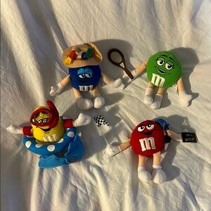 M&m plush.Yellow w/snorkel &floaty.Red w/racing flags Blue in fishing hat